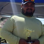 1st Place Adult - Carlos Morales holding trophy