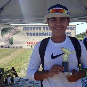 2nd Place Youth - Oscar Garza holding trophy